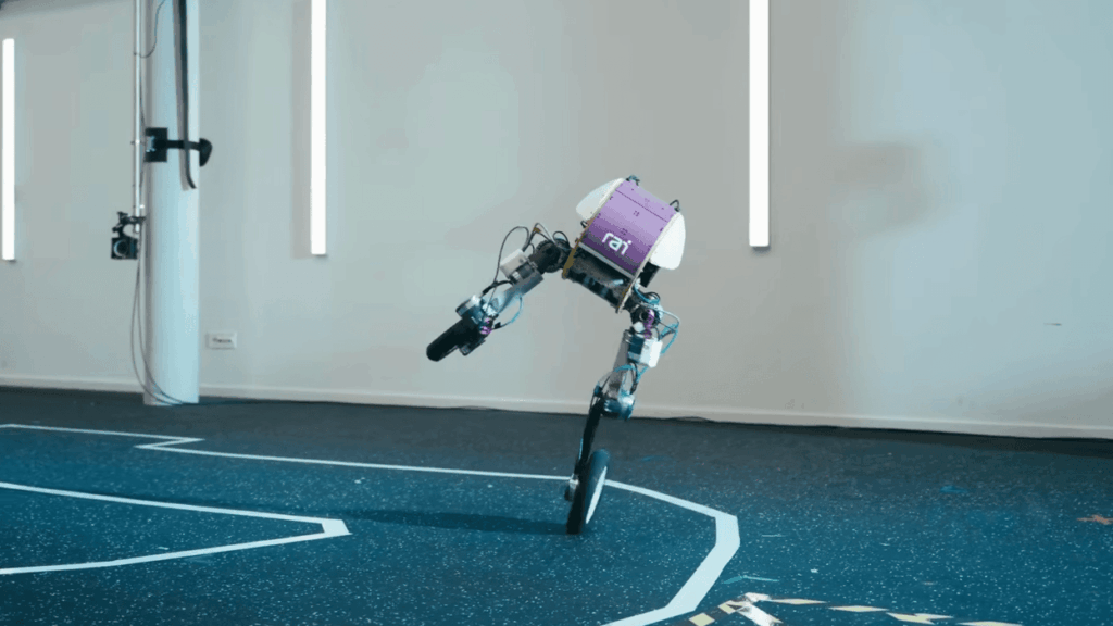 Roadrunner bipedal robot leaning while rolling on paired wheels