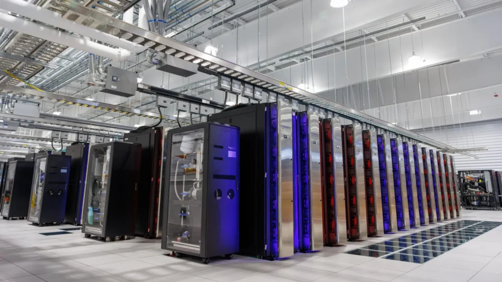 Rows of servers glowing inside a data center